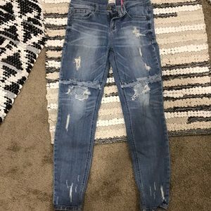 Sneak peek distressed jeans